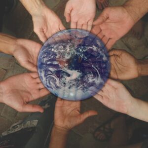 Circle of Hands supporting Earth