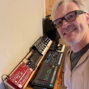 Dan Tomlinson with synthesisers